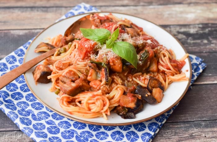 low fodmap pasta alla norma on a plate with a spoon in it