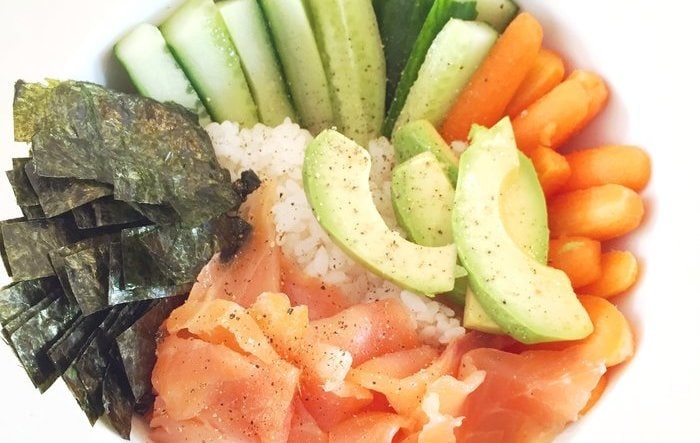 A low FODMAP salmon poke bowl photographed from above