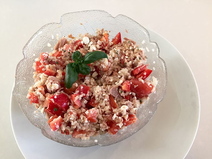 Rice salad with tuna in a glass bowl