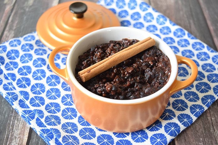A black rice pudding in a little oven dish