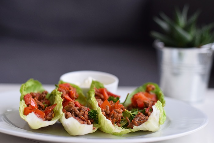 Four low fodmap mexican lettuce wraps in a row