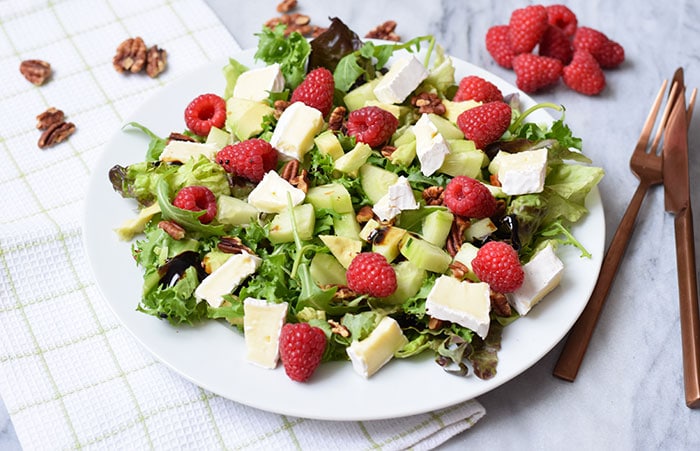 A low FODMAP raspberry brie salad with pecans