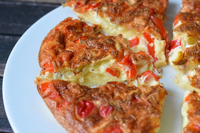 Low FODMAP oven-baked brie frittata cut into pieces
