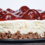 A zoomed in low FODMAP strawberry cheesecake from the side
