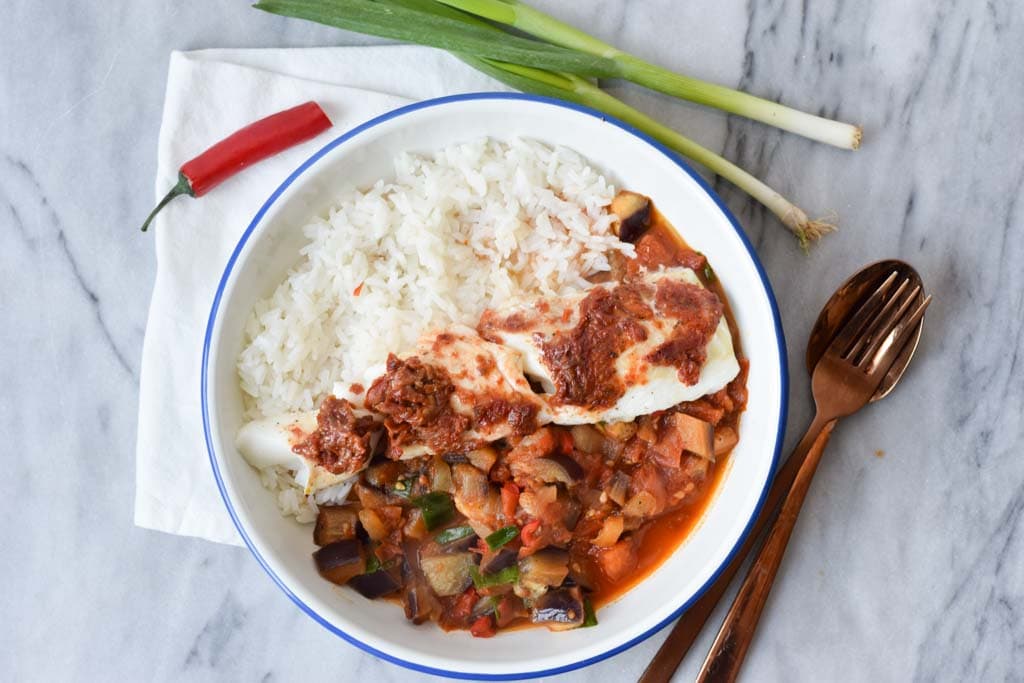 A bowl of low FODMAP ratatouille with haddock and white rice
