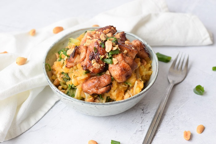 A bowl of low FODMAP Asian-style potato mash with chicken