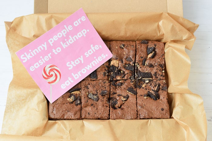 gluten-free brownies in a box with a card