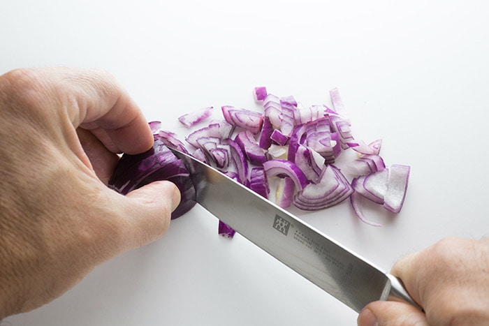 Somebody cutting onions