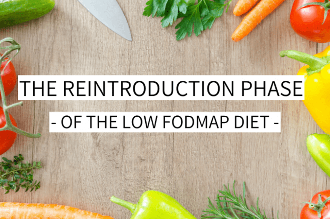 A cutting board with the text: the reintroduction phase of the low FODMAP diet