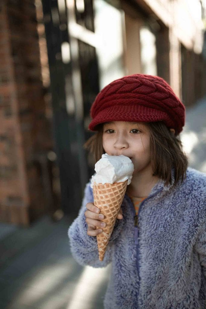 A girl eating an ice cream