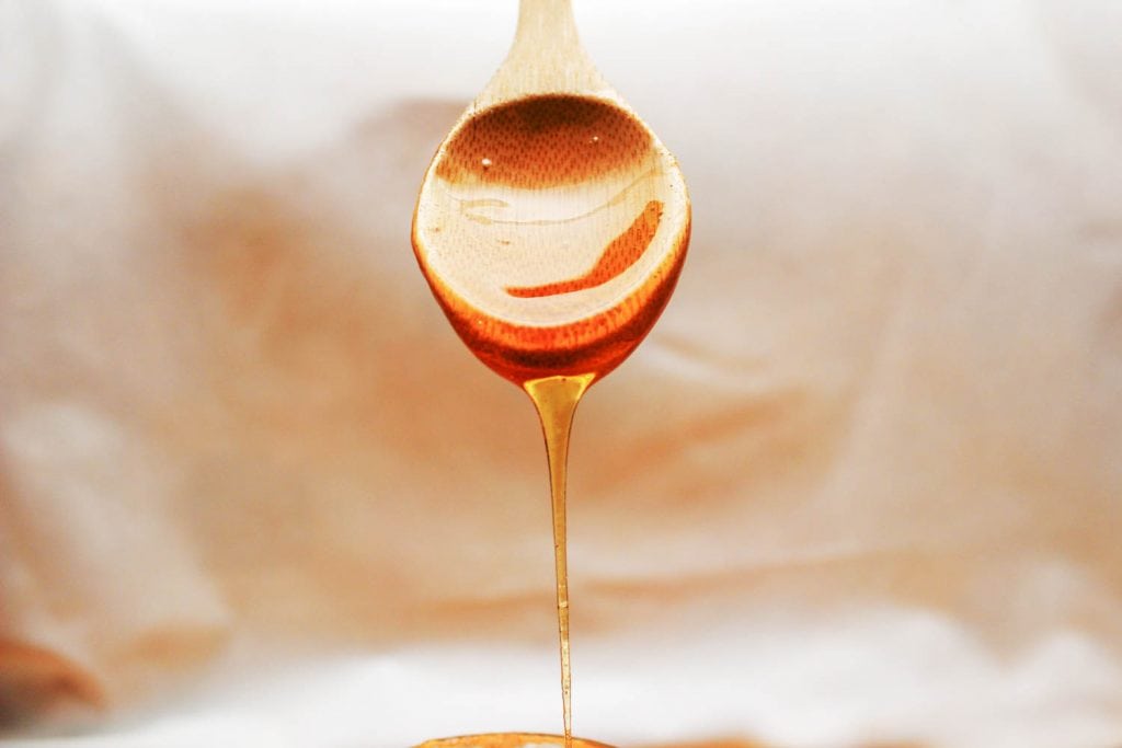 Honey on a spoon - FODMAP supplements