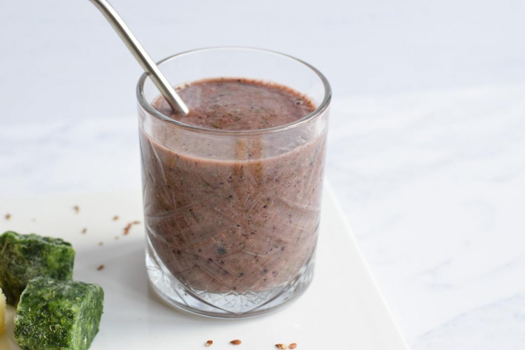 A low FODMAP fruit smoothie in a glass