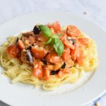 Low FODMAP with red pesto and cream sauce on a plate