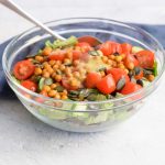 A bowl with low FODMAP roasted chickpea salad