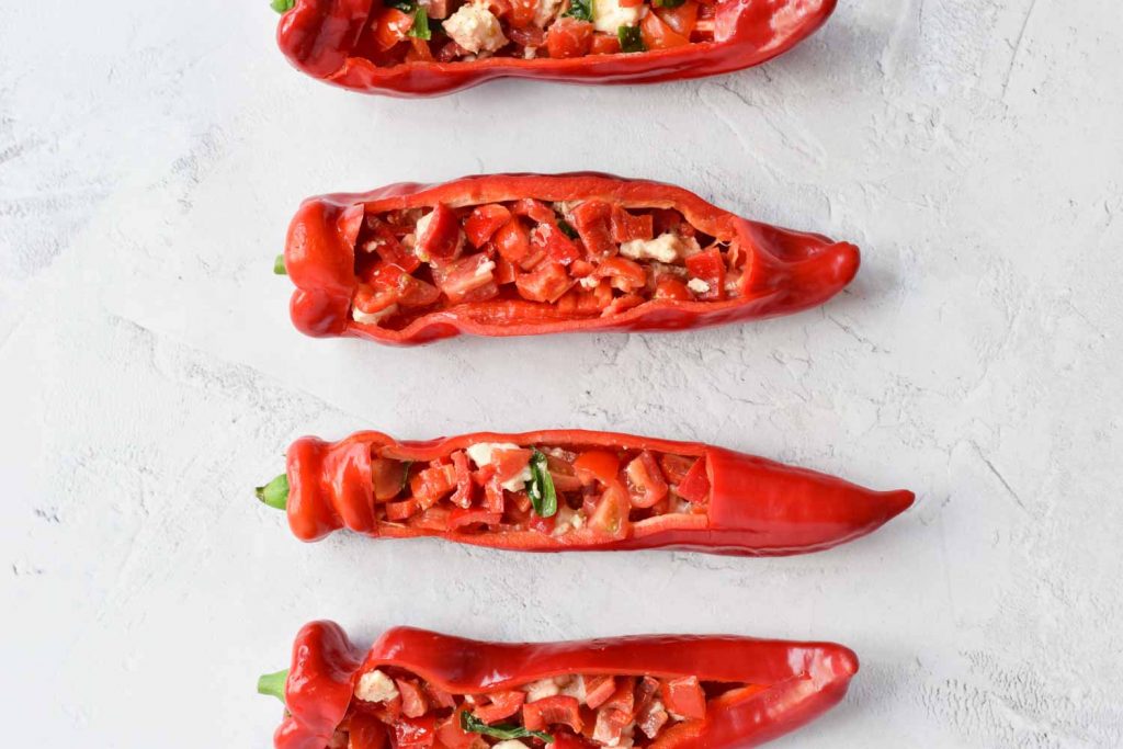 Four low FODMAP stuffed pointed peppers