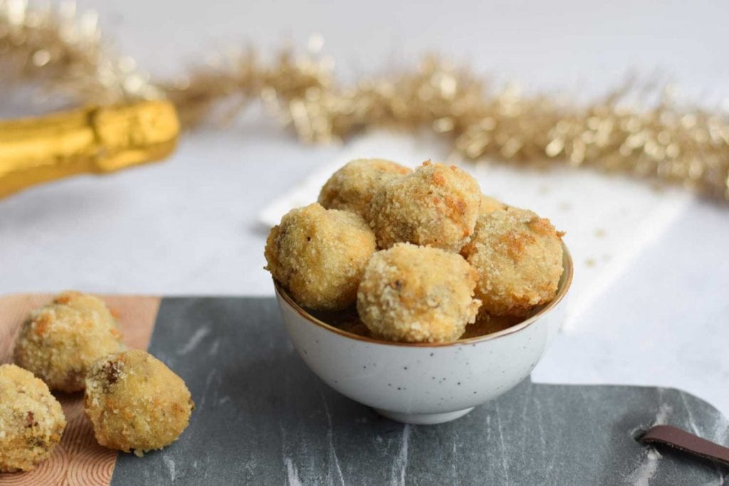 A bowl with low FODMAP mushroom croquettes