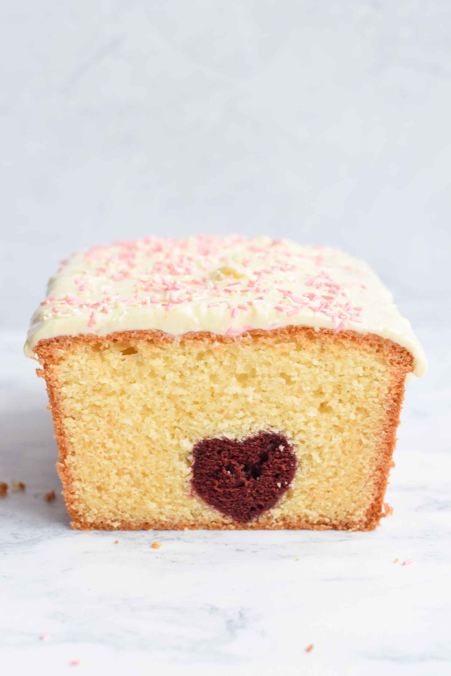 A gluten-free vanilla cake with a heart inside