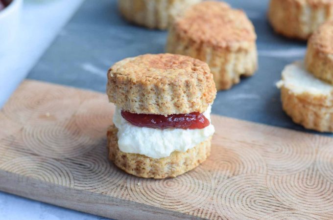 A gluten-free scone filled with jam and cream