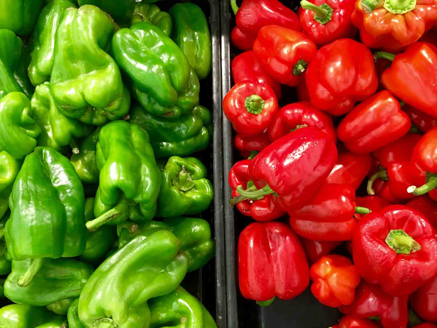 Green and red bell peppers together