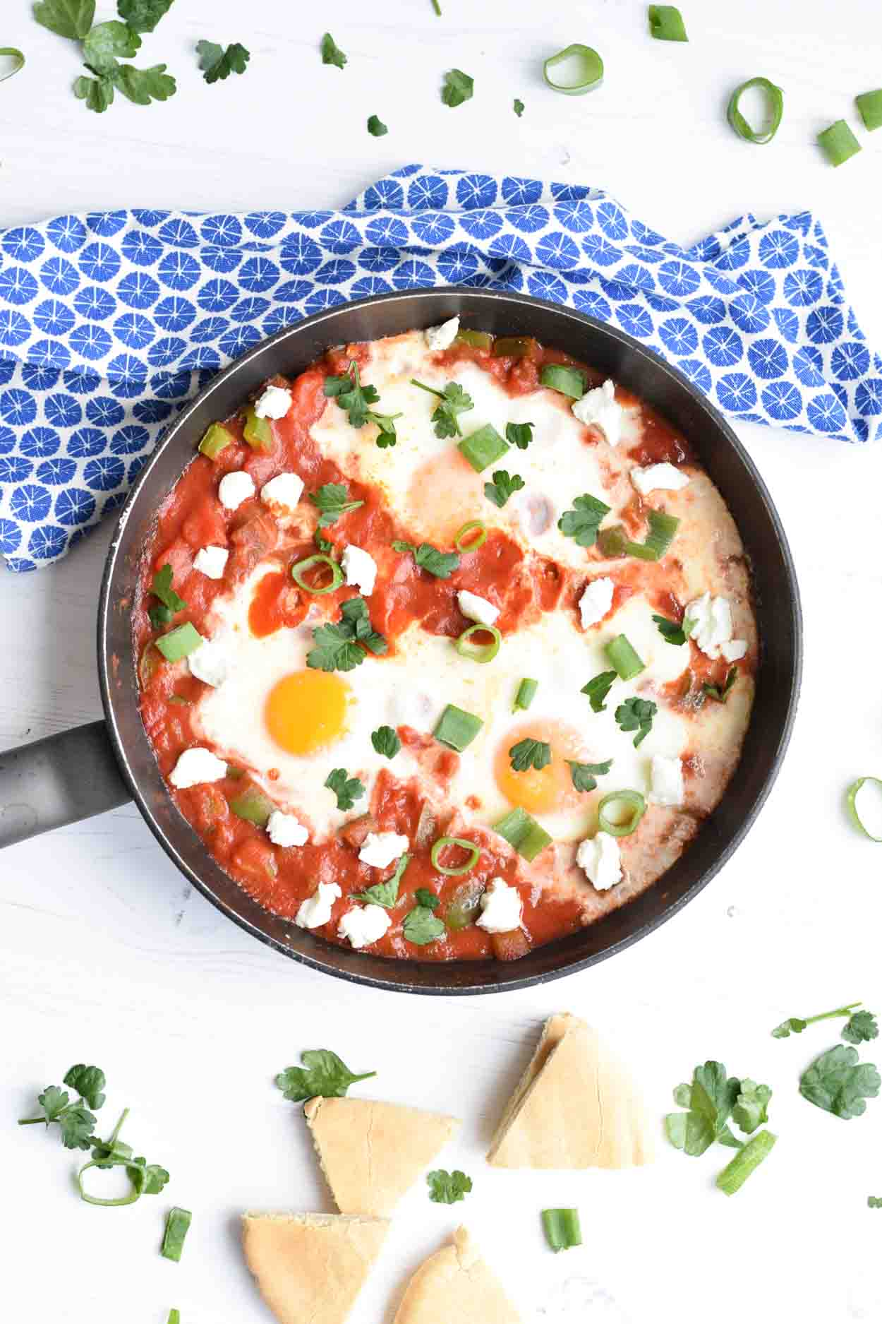 A pan with low FODMAP shakshuka shown from above