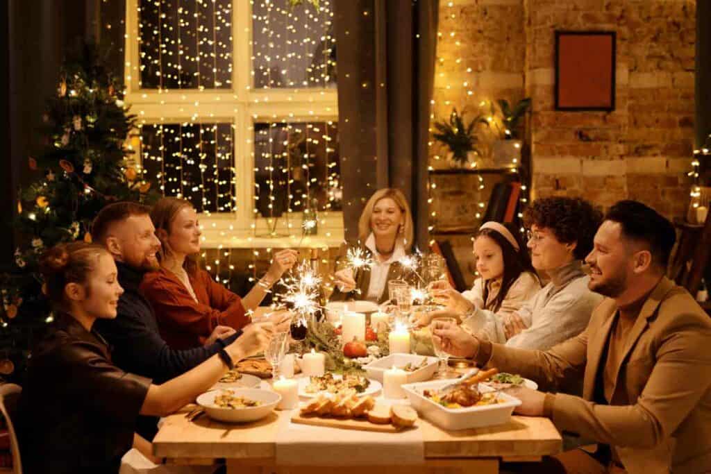A family sitting at the table for Christmas dinner