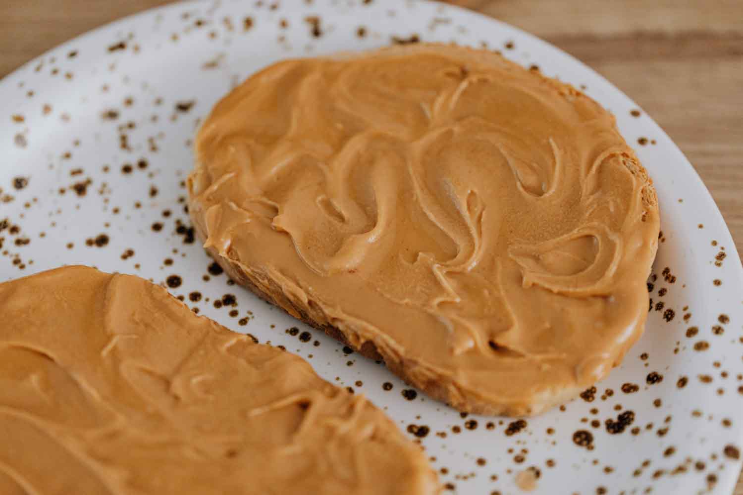 Peanut butter on a slice of bread