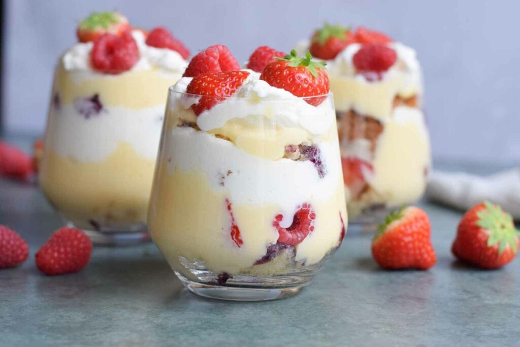 Low FODMAP trifles in a glass photographed from the side