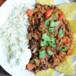 A plate of low FODMAP chili con carne